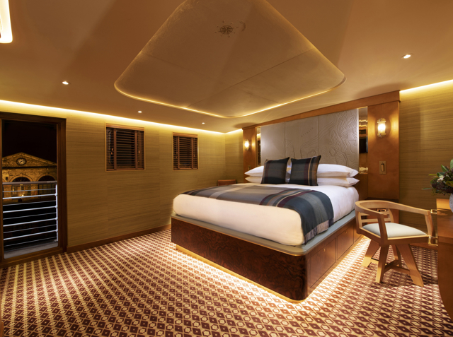 Super king size bed with under bed lighting in Fingal's Hyskeir luxury cabin room at 5 star hotel Edinburgh