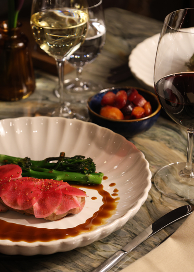 Roasted Devon duck breast, sweet-marinated mooli, broccolini, sauce bigarade